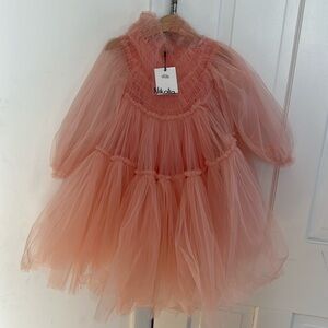 Nikolia sunrays dress Tulle dress with cotton lining.